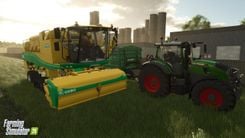 green and yellow tractor on the field