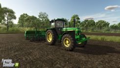 green tractor on a field
